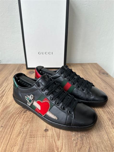 gucci pierced heart shoes.